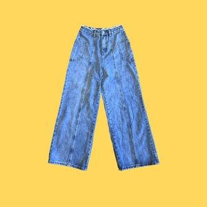 high-waisted wide leg medium-wash blue jeans